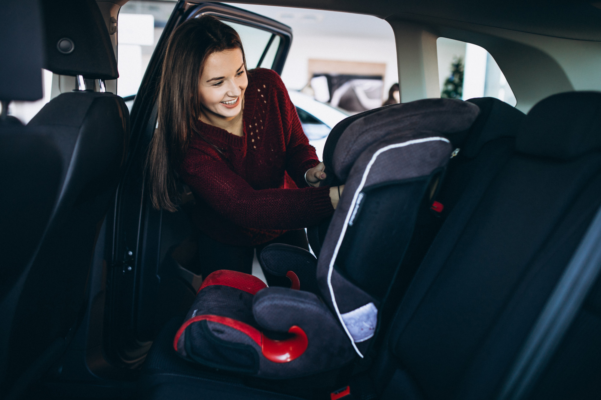 Highlighting the importance of a newborn car seat for safety.