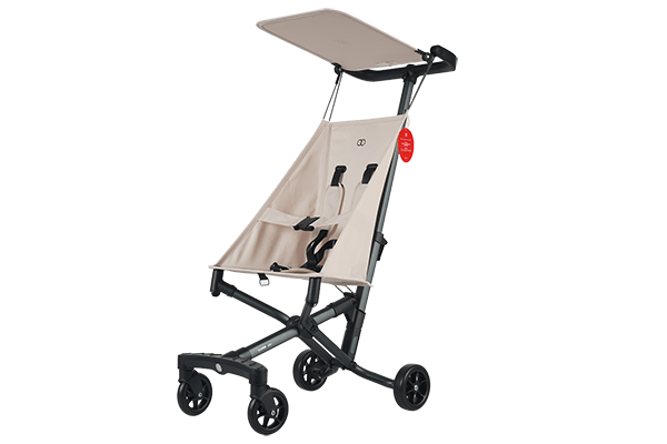 Side view of the Koopers Aero lightweight travel stroller in beige, designed for compact folding and convenient portability for families in Malaysia.