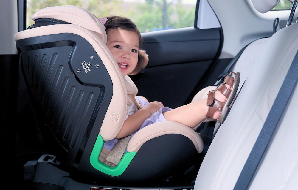 understanding-baby-car-seat-installation-in-malaysia-step-by-step-guide-4 Toddler sitting safely in a rear-facing baby car seat installed in Malaysia