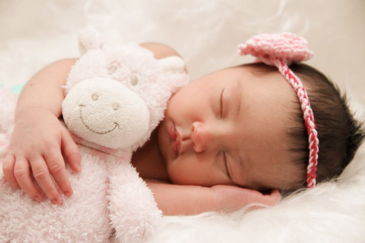 newborn-baby-checklist-for-malaysian-parents-2 Yawning baby wrapped in blanket – part of newborn sleep preparation guide for Malaysian parents