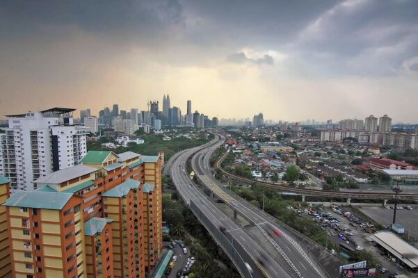 how-to-baby-proof-your-car-for-a-safe-car-1 Kuala Lumpur city highway with traffic — baby car safety in Malaysia context
