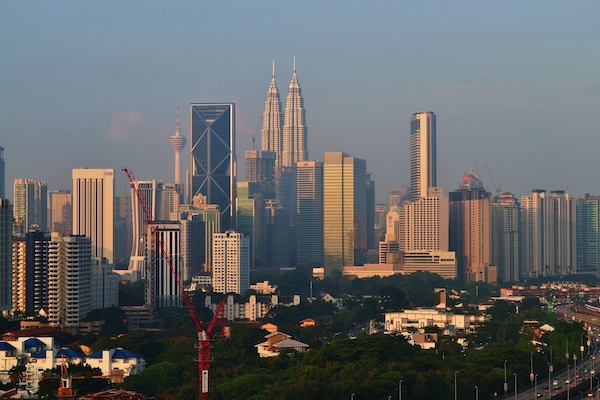 why-baby-car-seat-expiry-date-matters-4 Kuala Lumpur city skyline symbolising car travel and the importance of baby car seat safety in Malaysia.
