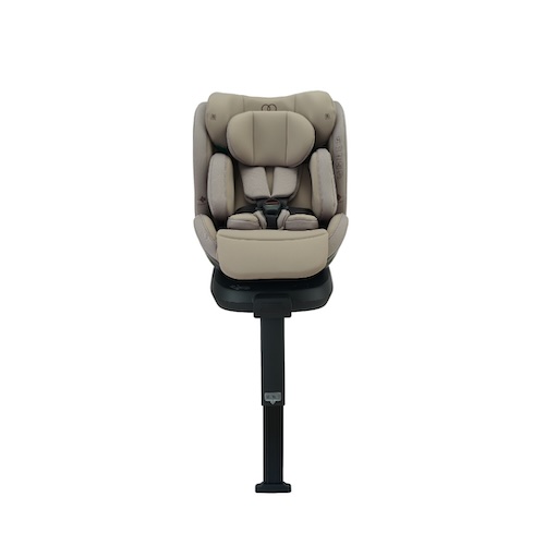 Koopers Armour baby car seat in beige, shown from the front with padded headrest, harness straps, side cushioning and support leg on a white background.